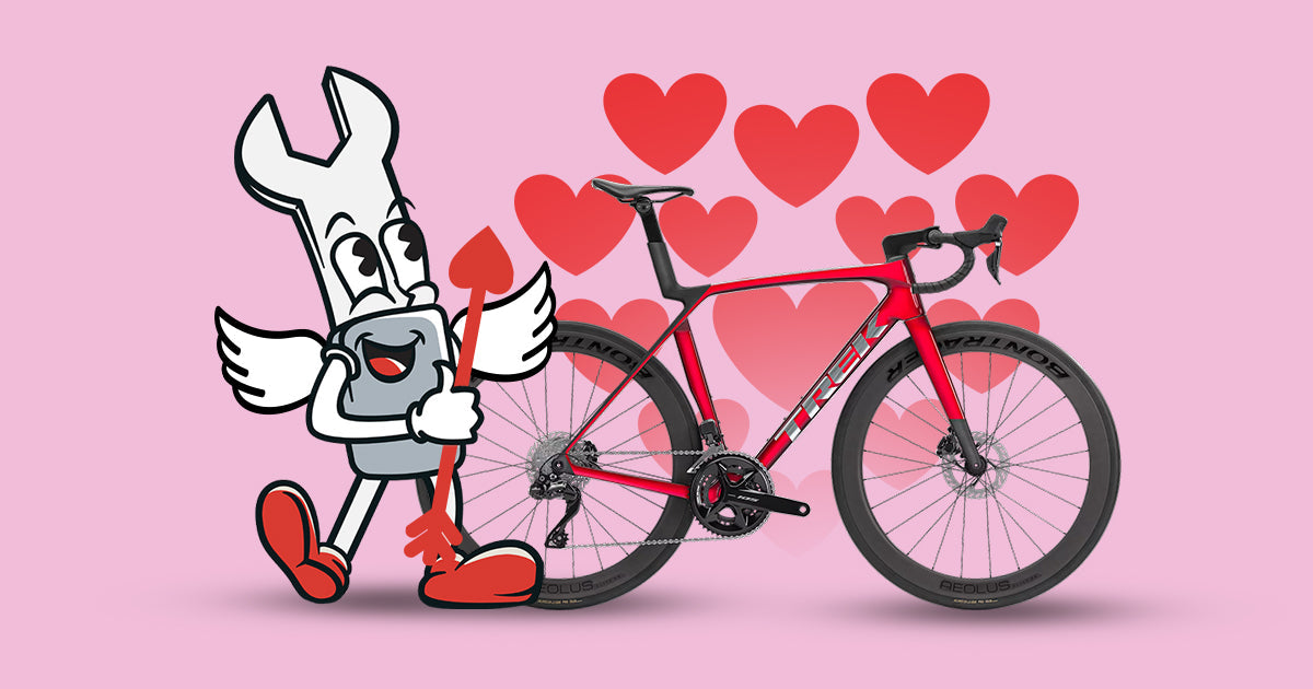 Cartoon cupid standing in front of a bicycle with hearts in the background / Cupidon cartoon devant un vélo, cœurs en arrière-plan