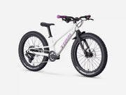 Trek Wahoo 20 Trail kids’ mountain bike in Crystal White, front three-quarter product view showing the white frame, fluorescent purple Trek logo, handlebars, brake levers, and purple grips