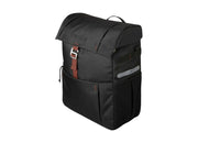 Gazelle bicycle pannier in black, three-quarter product view showing the brown mounting strap and brown stitching