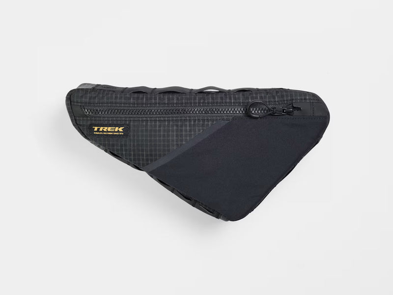 Trek Adventure Triangle Bag 1.3L on a white‑grey background showing zipper, patterned material, black panels and visible pouch with straps.