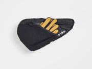 Rear view of the Trek Adventure Triangle Bag 1.6L showing the back pouch with cycling gloves and accessories inside.