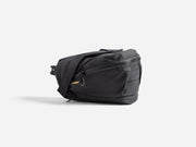 Black bag with a visible brand logo on a white background
