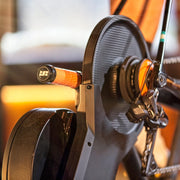 Closeup lifestyle shot focusing on the flywheel and upper trainer section