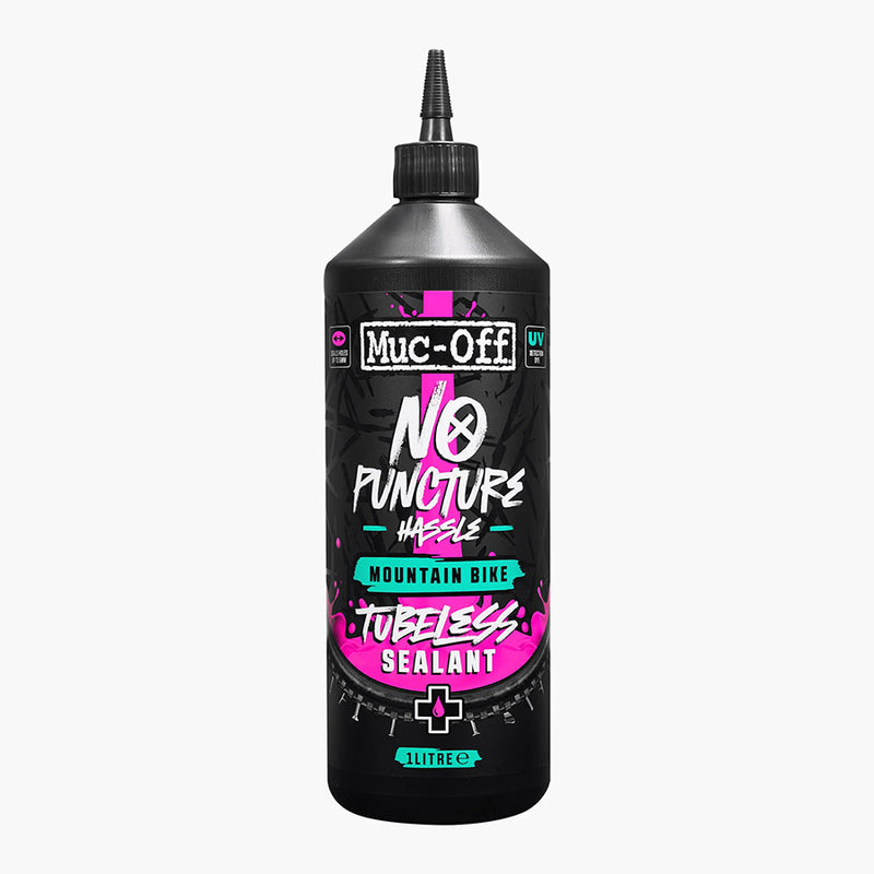 Muc-Off No Puncture Hassle tubeless sealant bottle on a white background