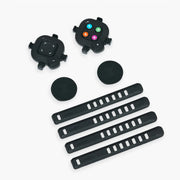 Zwift Click V2 controller with mounting straps and round adapters on white background