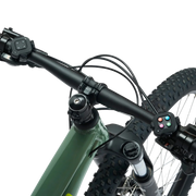 Zwift Click V2 controllers attached to bike handlebars on transparent background