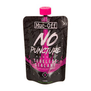 Muc-Off No Puncture Hassle Tubeless Sealant packaging on a white background