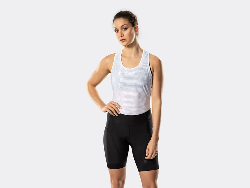Bontrager Anara women's black cycling shorts front view on model, featuring a wide comfort waistband, fitted performance cut, ergonomic panel stitching, and Bontrager logo detail on the left leg.