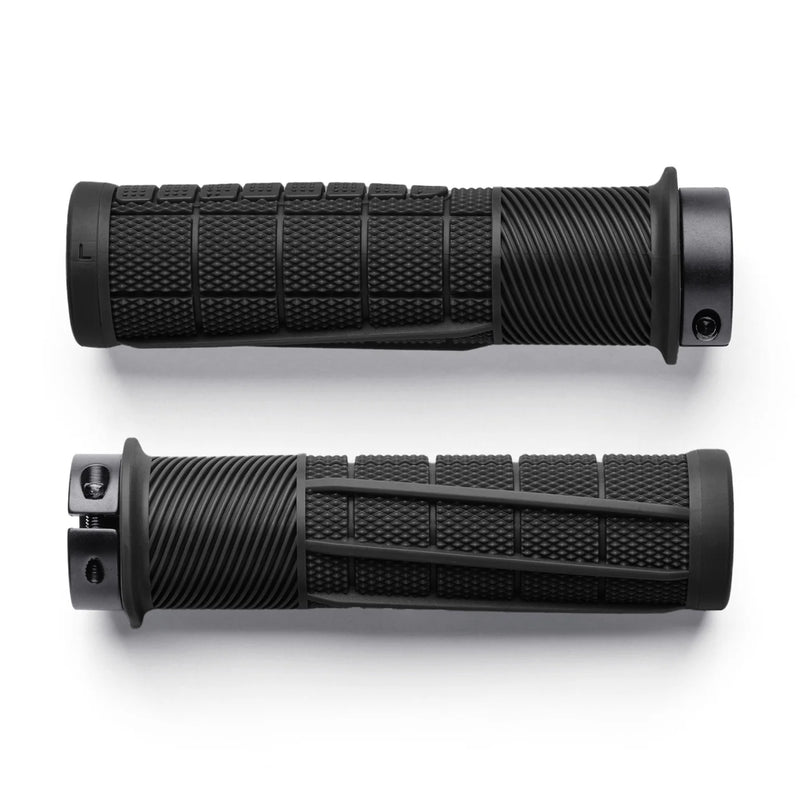 Two black motorcycle grips with textured pattern on a white background