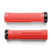 Two red bicycle grips with black ends on a white background