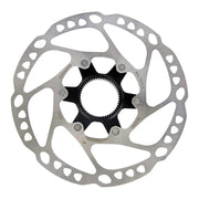Bicycle disc brake rotor with a black center on a white background