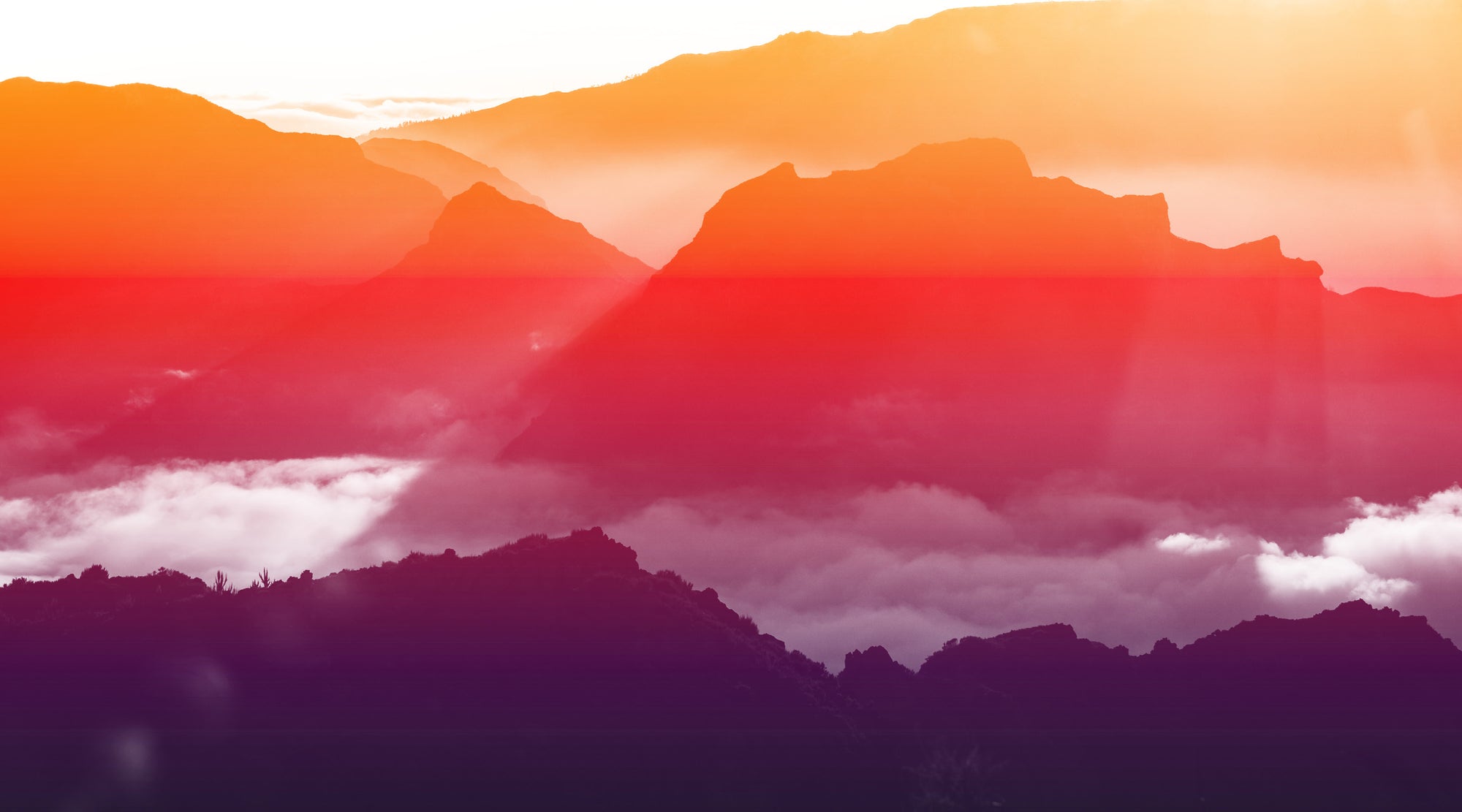 Colorful mountain landscape with a gradient sky