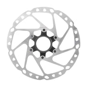 Bicycle disc brake rotor on a white background