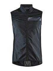 Craft Essence Light wind vest in black, front view zipped up with stand-up collar and clear strip on the left chest