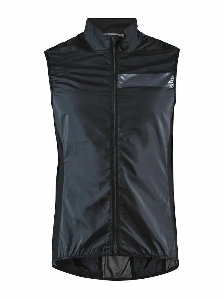 Craft Essence Light wind vest in black, front view zipped up with stand-up collar and clear strip on the left chest