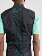 Craft Essence Light wind vest in black worn, close-up back view with clear center panel and drop tail