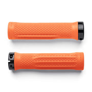 Two orange bicycle grips with black ends on a white background