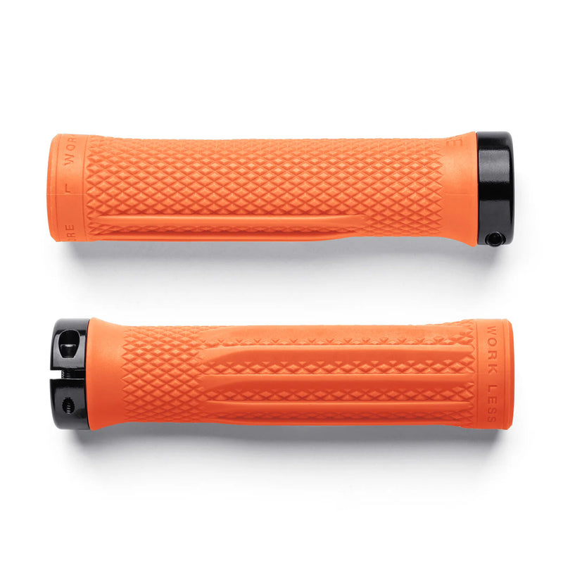 Two orange bicycle grips with black ends on a white background