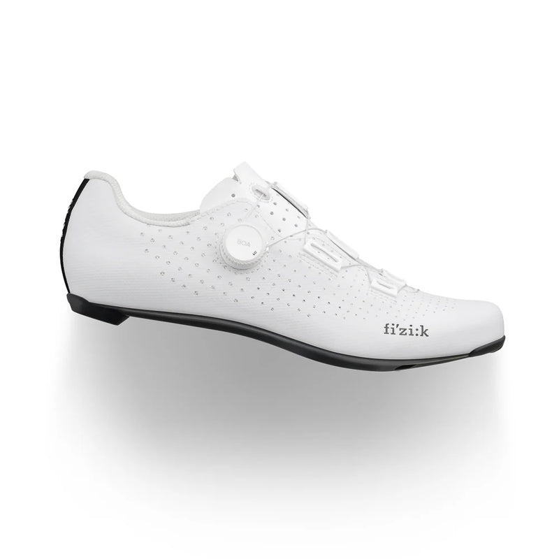 White cycling shoe with black sole on a white background