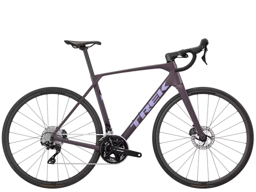 A matte dark purple Trek road bicycle with black components, drop handlebars, and disc brakes, shown from a side profile on a solid white background.