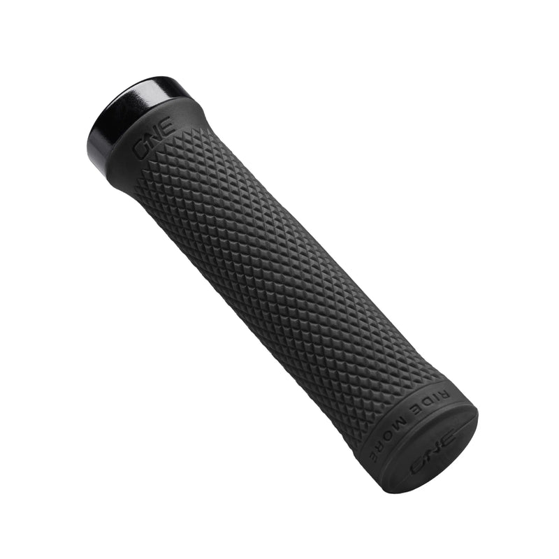 Black bicycle handlebar grip on a white background