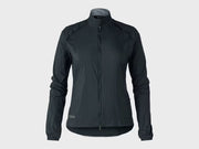 Product front image of a woman's cycling jacket - long, sleeved, full zip with a mock neck and detailed logo patch on the bottom left.