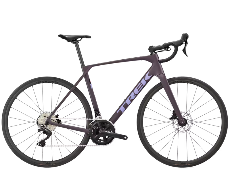 Trek Domane SL 4 Gen 5 road bike in Matte Nightshade, full side view showing Trek frame, handlebars, saddle, drivetrain, and wheels