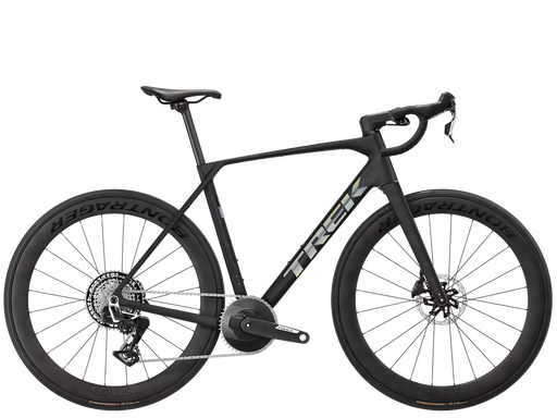 A black Trek endurance road bicycle with drop handlebars, deep carbon fiber wheels, and a central chain guard, shown from a side profile on a solid white background.