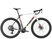 A Trek endurance road bicycle with a white top tube, black frame and components, and lime green and orange accents, shown against a solid white background.