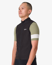 Rapha Core Cycling Gilet worn by a model, side view with full-length zipper closed and mock-neck collar visible