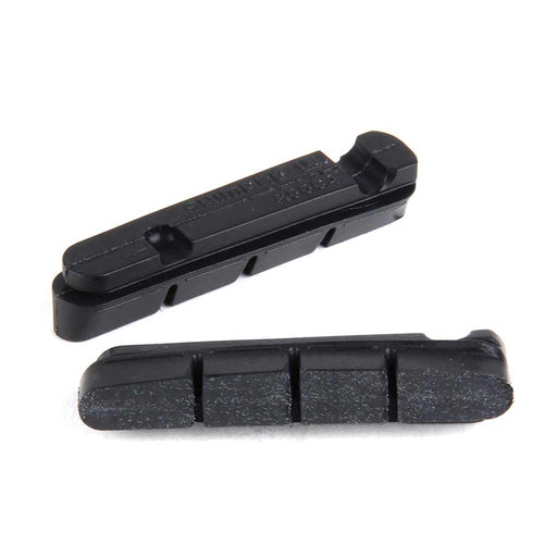 Two black brake pads on a white background