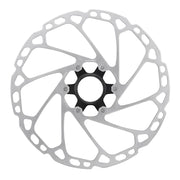 Bicycle disc brake rotor on a white background