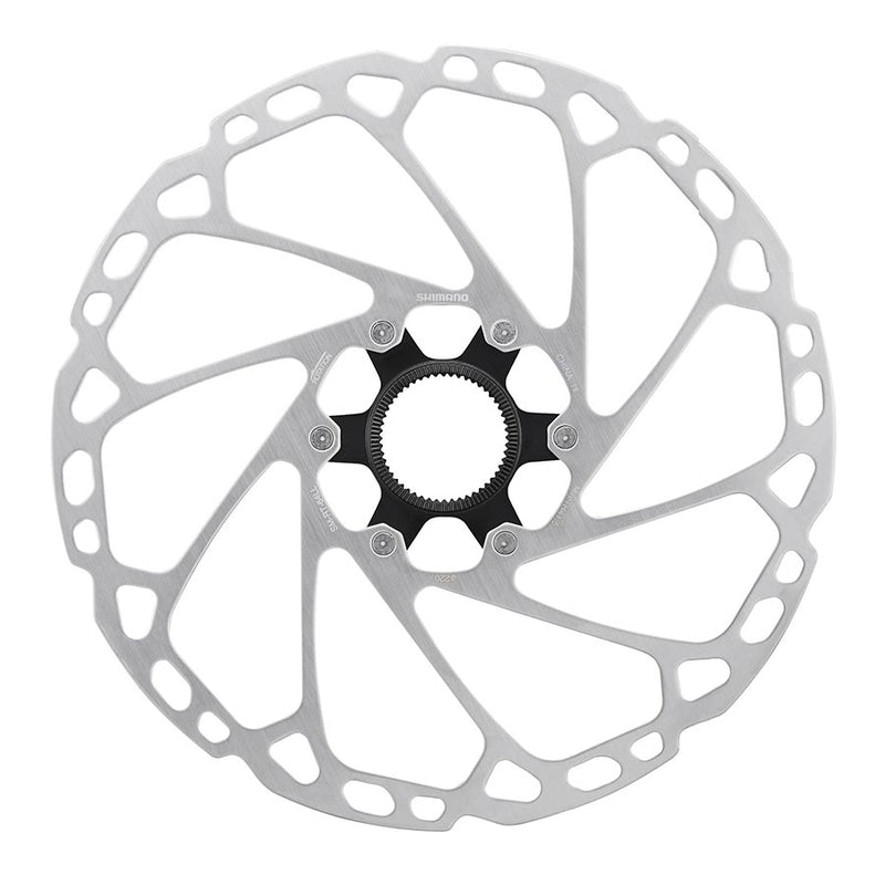 Bicycle disc brake rotor on a white background