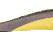 Extreme close-up of insole edge showing yellow fabric binding, detailed perimeter stitching, and durable brown composite base material construction