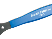 Close-up of a Park Tool PW-5 chain tool handle with a blue ergonomic grip and a dark metal end, featuring the Park Tool logo on a white background.