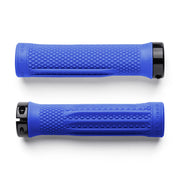 Two blue bicycle grips with textured surface on a white background