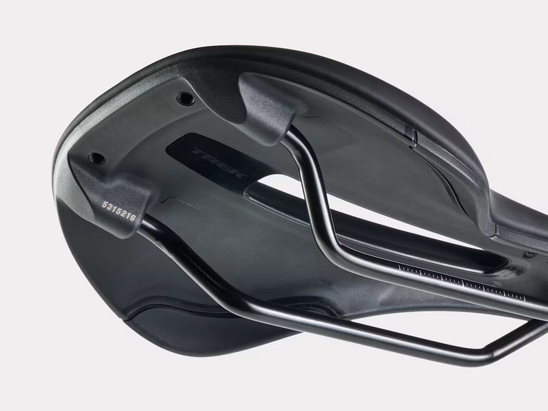 Close-up of a black bicycle seat on a white background