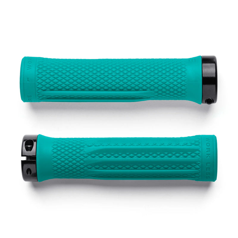 Two teal bicycle grips with black ends on a white background