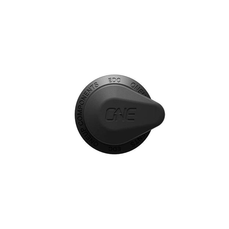 Black cap with 'ONE' branding on a white background
