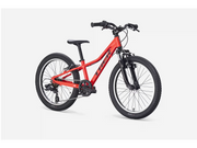 Bright Red children's bicycle on a white background