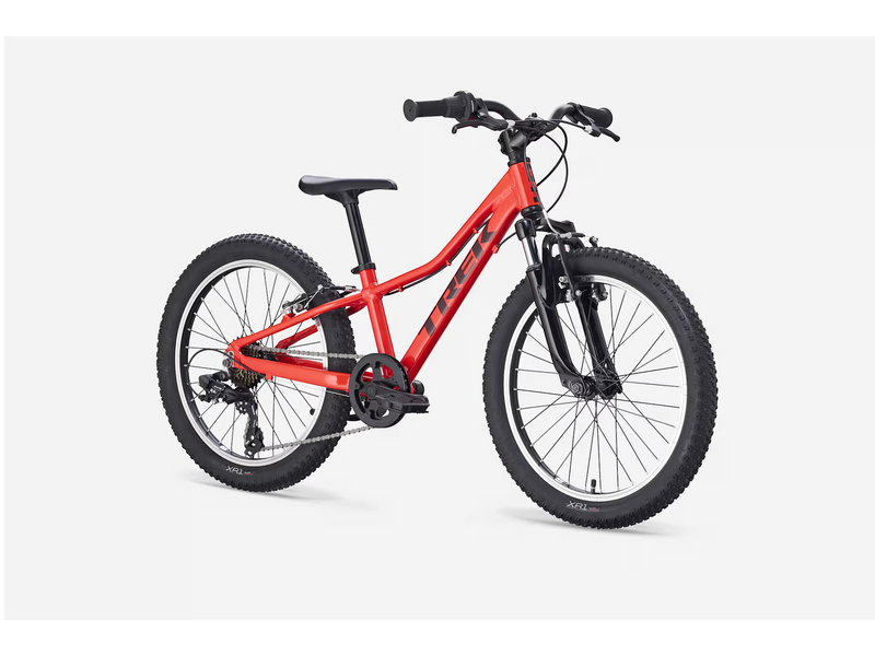 Bright Red children's bicycle on a white background