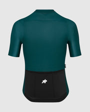 Green cycling jersey with a brand logo on a gray background
