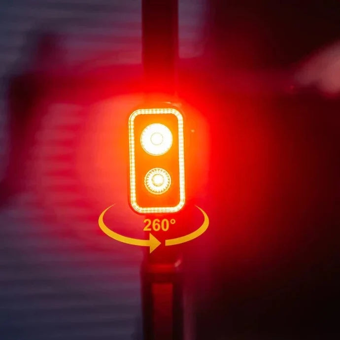 Magicshine Seemee 300 taillight lit on a bicycle seatpost, showing its 260-degree rear visibility