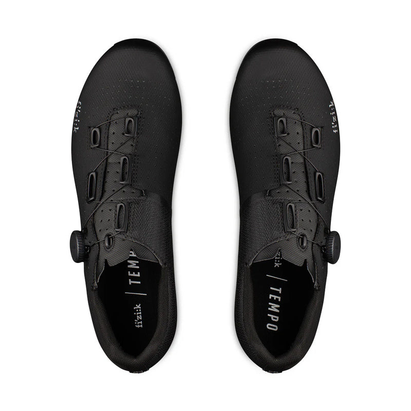 Black cycling shoes with 'Tempo' branding on a white background