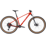 Red hardtail mountain bicycle with brown tires on a transparent background