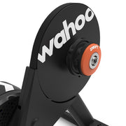 Close-up of the Wahoo KICKR CORE 2 with Zwift Cog and Click smart trainer, showing the Wahoo branding and orange Zwift Cog mounting interface