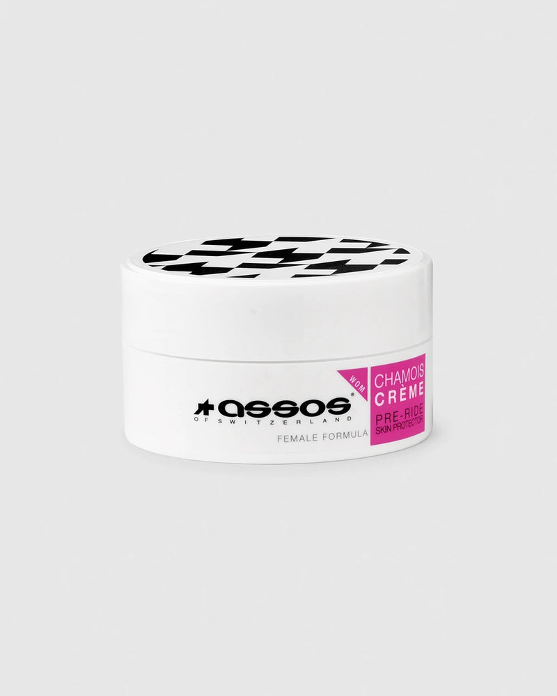 White jar of Chamois Creme with black and pink label on a white background