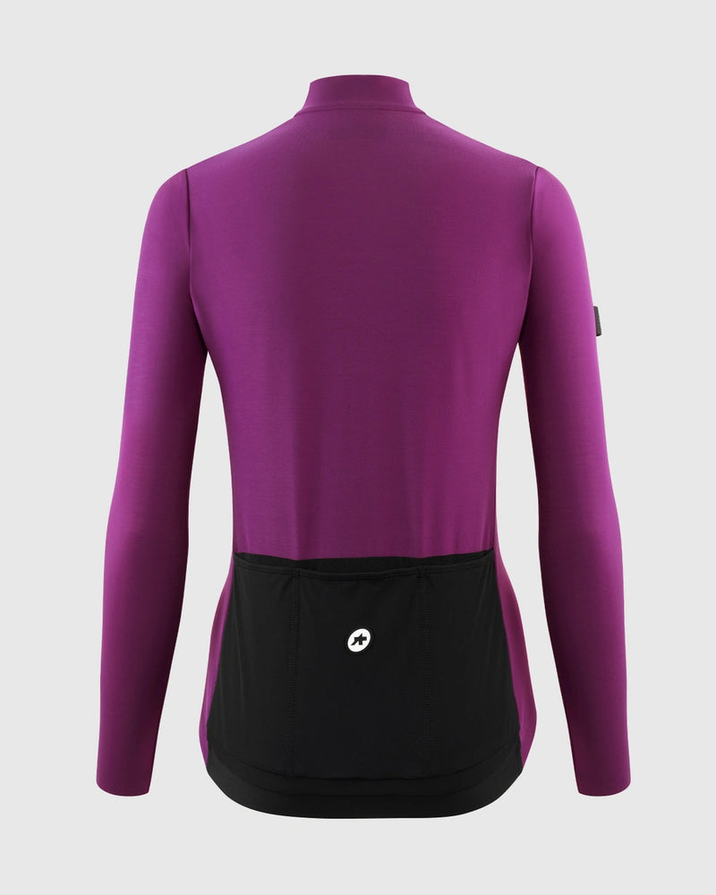 Assos UMA GT Spring Fall LS Jersey C2 in Purple Alchemy, ghosted back view showing the black rear pockets, three-section pocket layout, central ASSOS logo and mock neck