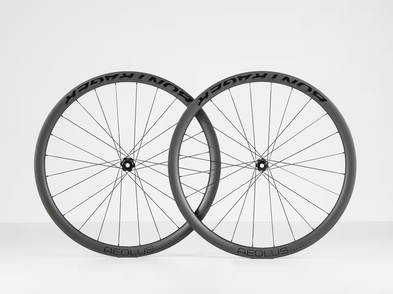 Two bicycle wheels with 'AEOLUS' branding on a white background