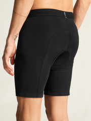Close-up of black Craft Everyday Bike Liner Shorts on a model, back three-quarter view showing the leg cuff and seat stitching